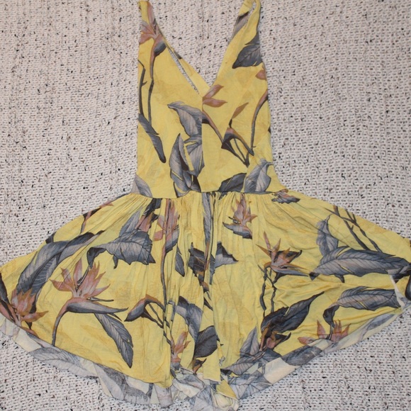 Urban Outfitters Dresses & Skirts - CUTE YELLOW ROMPER